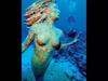 sunset-mermaid-by-stephen-frink-at-grand-cayman-2007-02